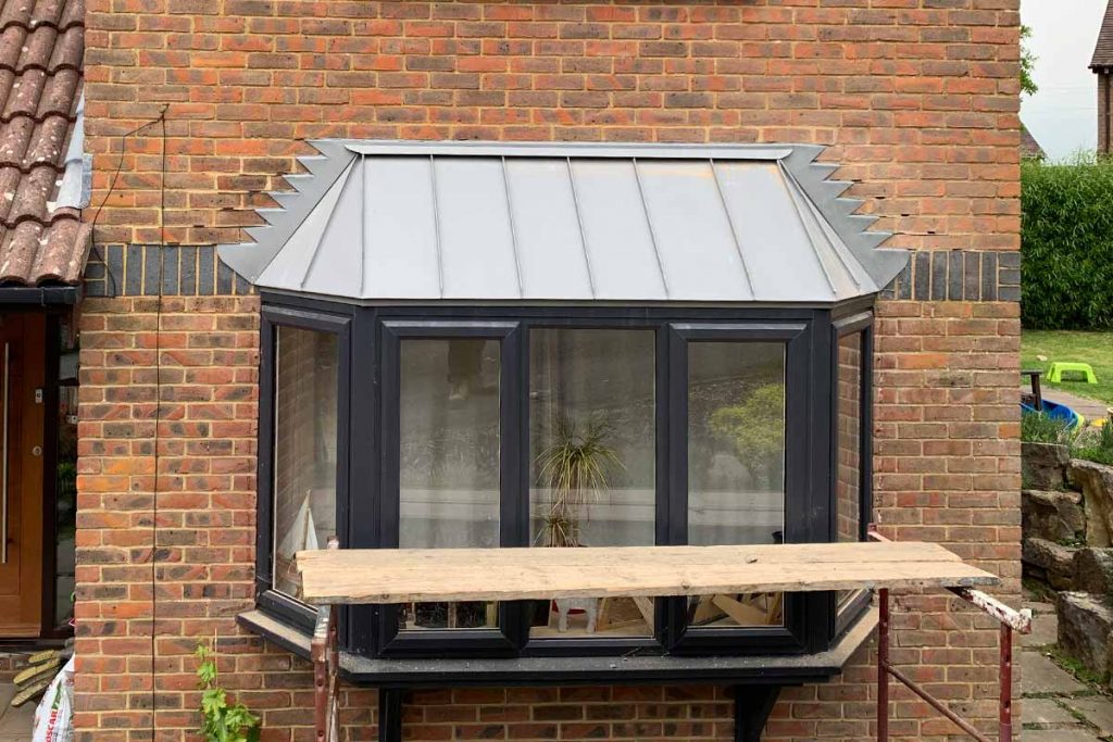 Metal canopy for residential building